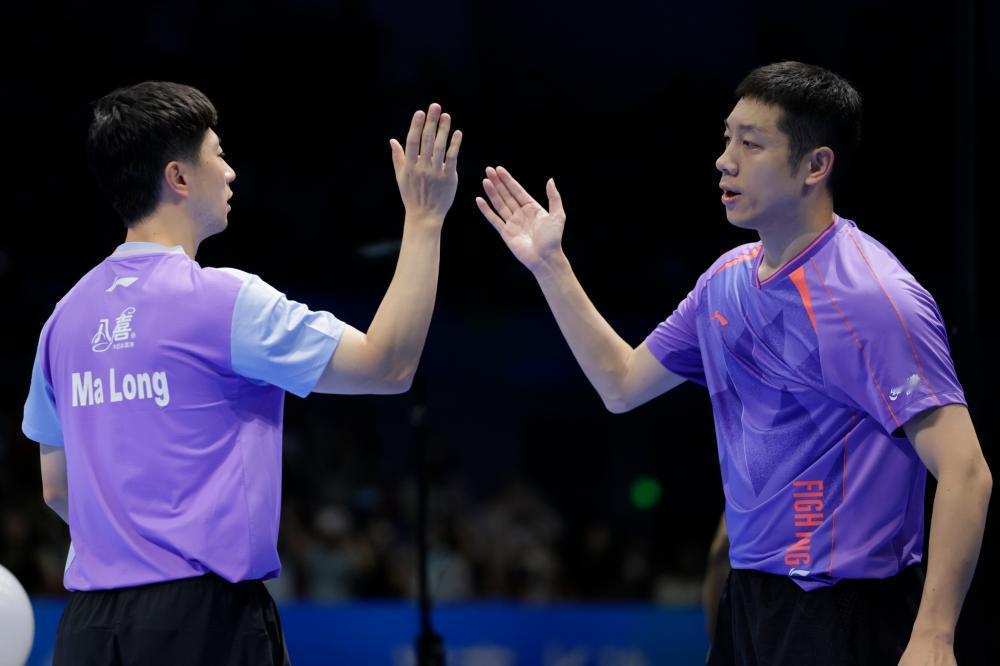 7月19日龙蟒组合马龙、许昕3-0横扫林高远/袁烜松冲进决赛，赛场内外的互动细节