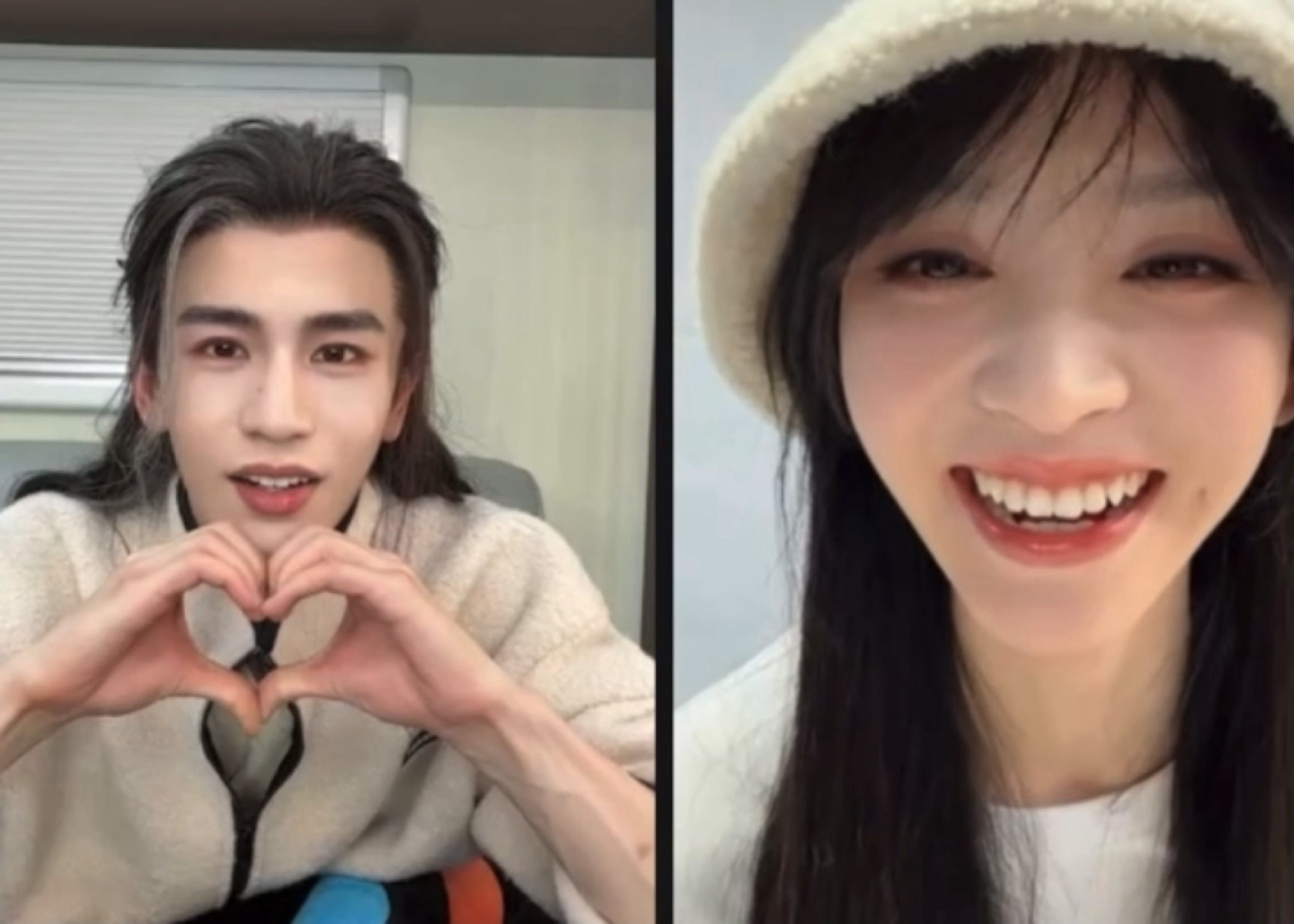 “你是不是就想比这个呀～”一个在那呆呆的比心一个在那萌萌滴笑