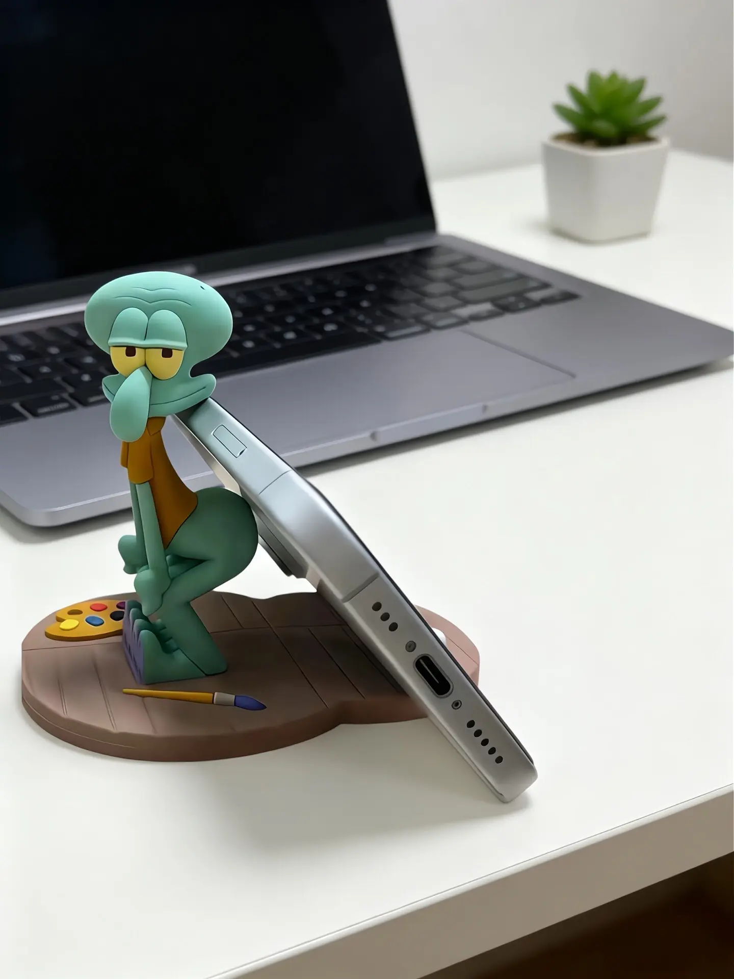 章鱼哥的屁股好翘 可以支起我的手机啊！