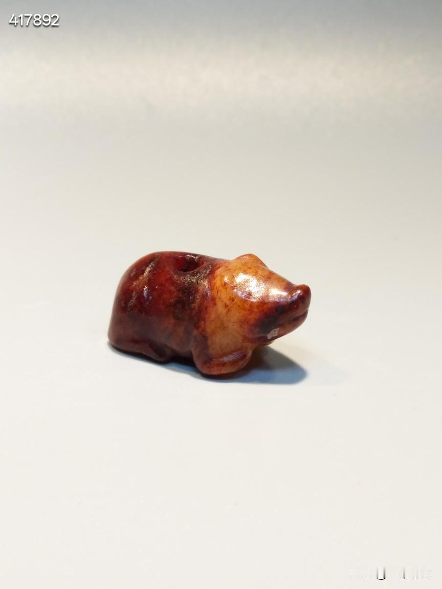 玉猪
流行于:战汉魏晋或后期
和田玉吃沁