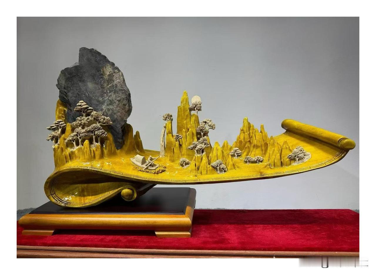 金丝楠木雕•江山如画

江山如画这一作品，以苏轼《赤壁怀古》为蓝本开展雕刻创作。