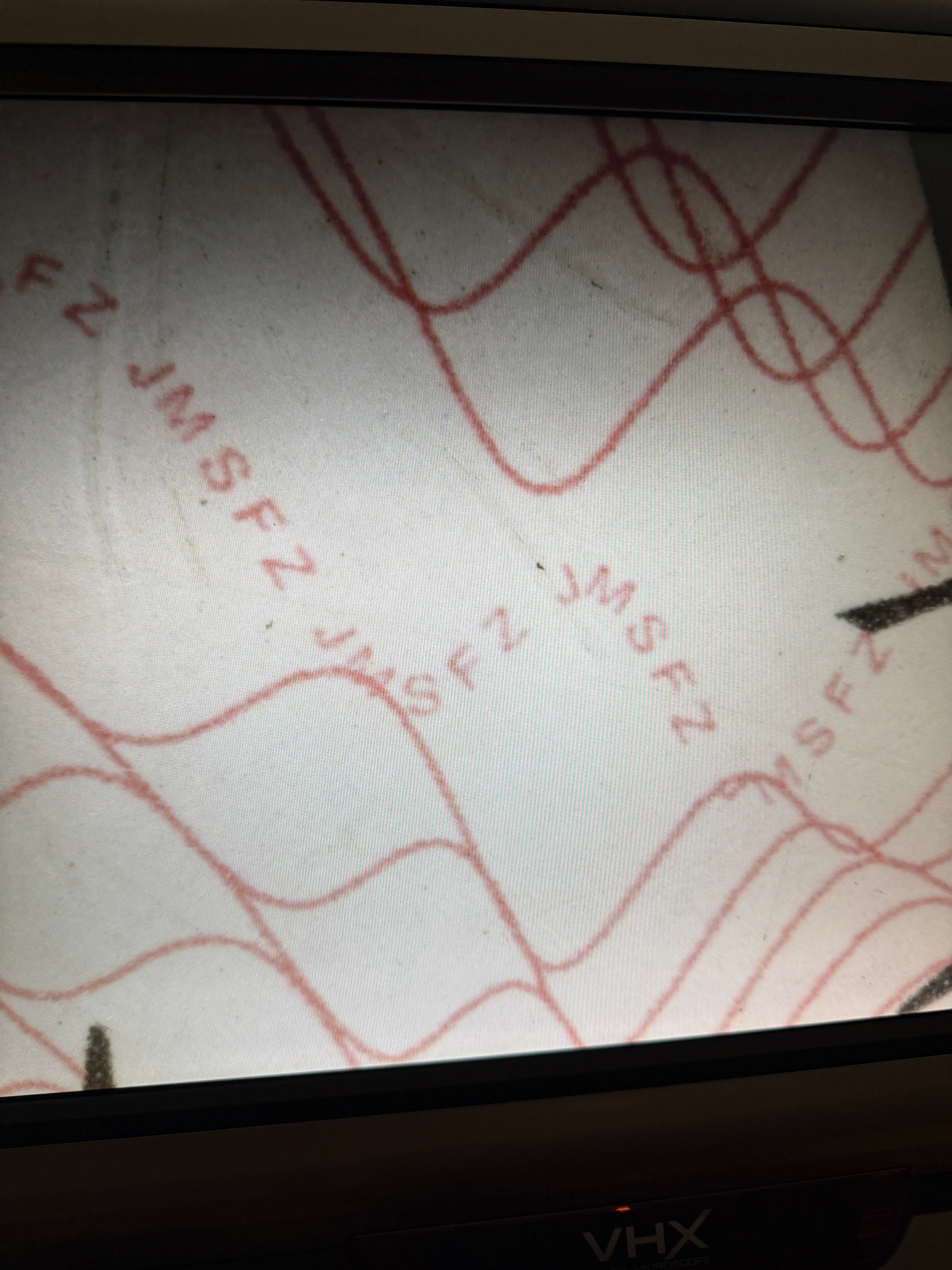 手机放大身份证竟藏微缩字母  用显微镜看了下、我的身份证果然有 JMSFZ 微缩