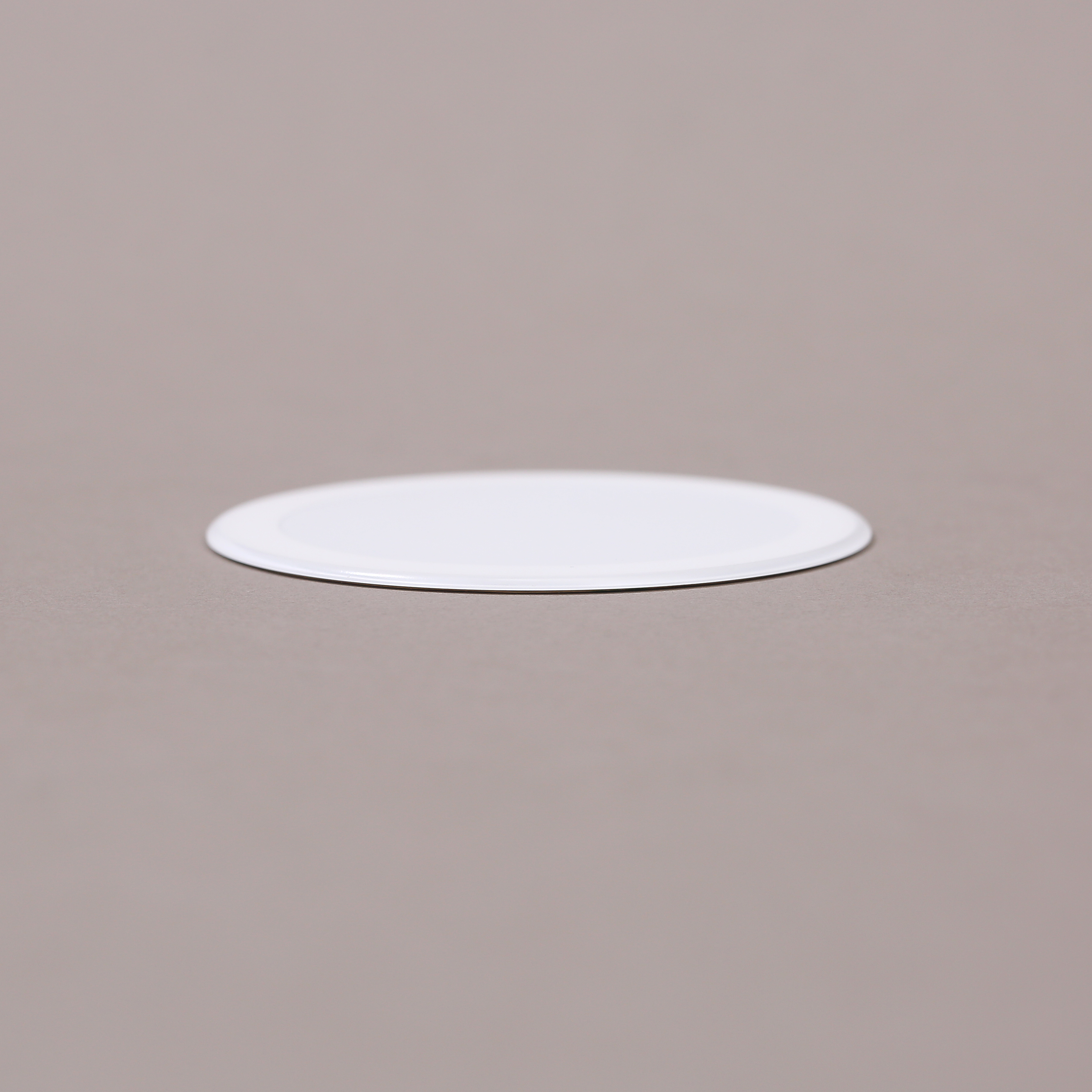 白天上这个小片片纯色版的引磁片。这个东西最早我们是做图案的，但是自从我们开始做平