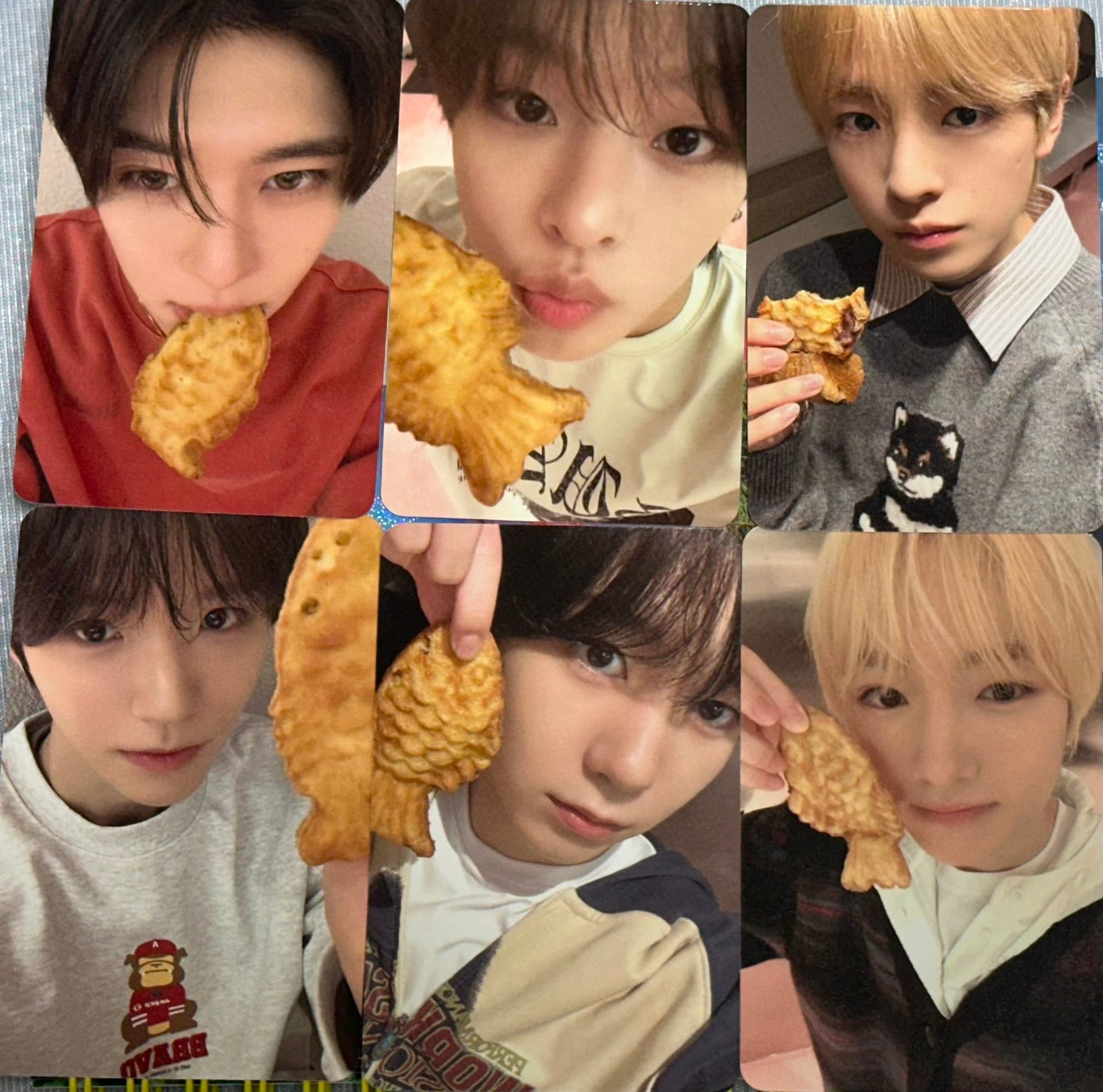 给NCT WISH成员们分发鲫鱼饼用来拍摄小卡照片，但YUSHI在开拍之前嘴先动