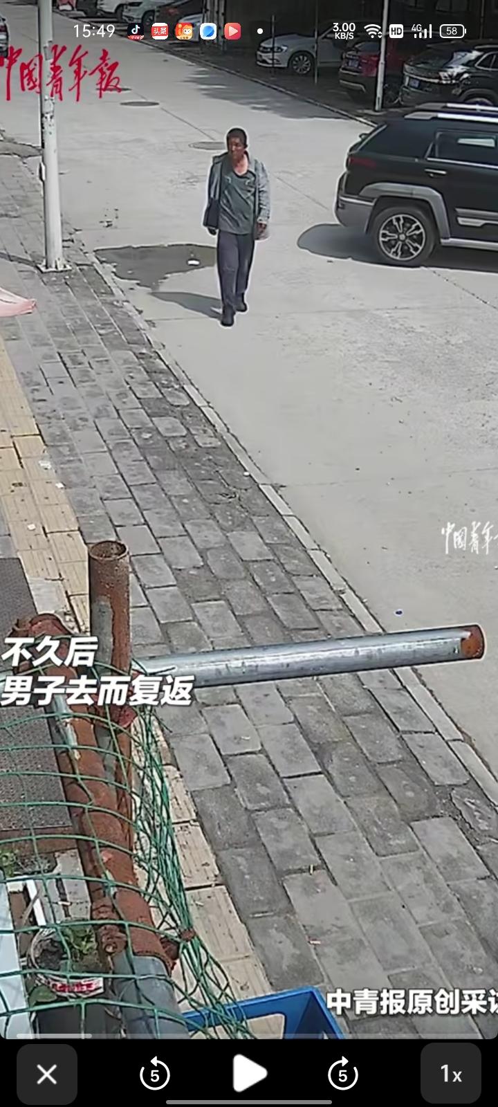 5月23日，北京。男子身陷窘迫没钱回家，在路边超市徘徊，终于鼓起勇气向老板解释要