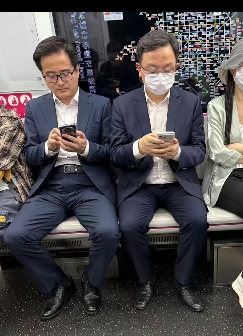王传福用的手机是苹果还是华为？