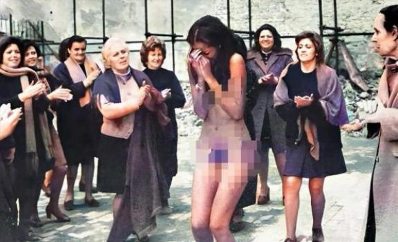 1945年，法国巴黎，这位名叫伊娃的女人，衣服被人扒了下来，丰腴的身体没有任何遮