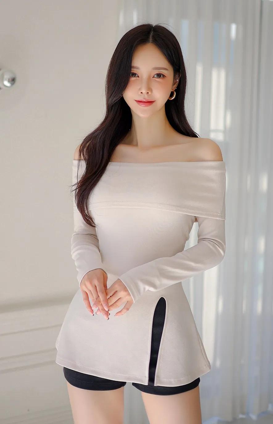 温柔优雅的白色露肩上衣，搭配黑色短裤，简约而时尚。商务女装风格应该怎么样穿搭 分