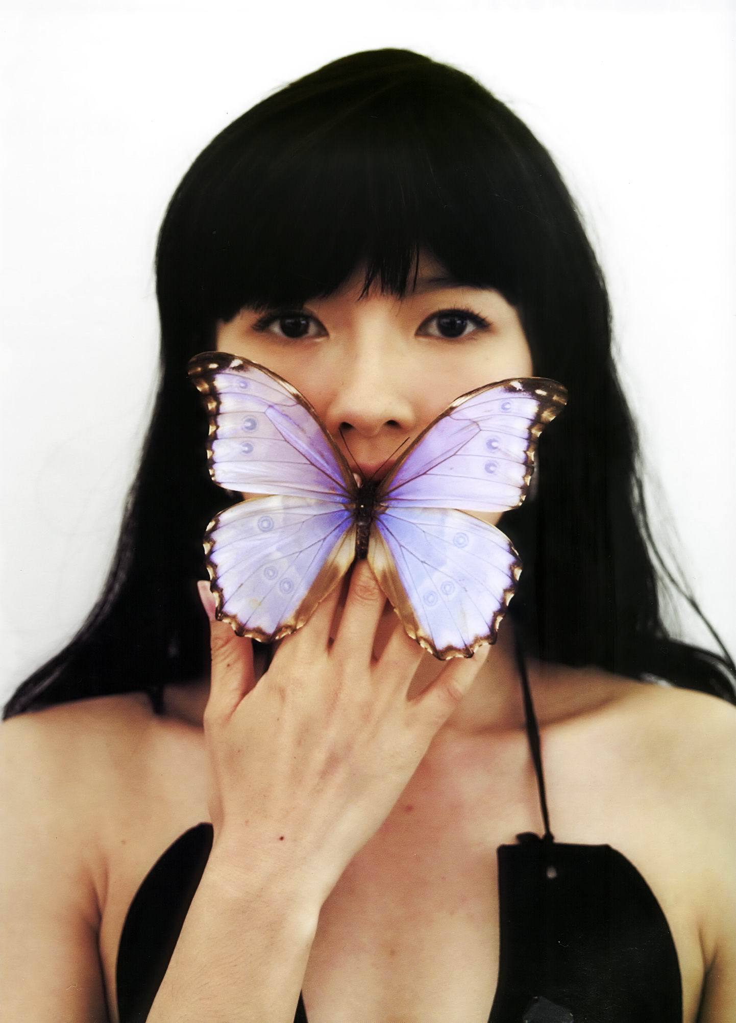 2003年，出演《紫蝴蝶》时期的章子怡。 