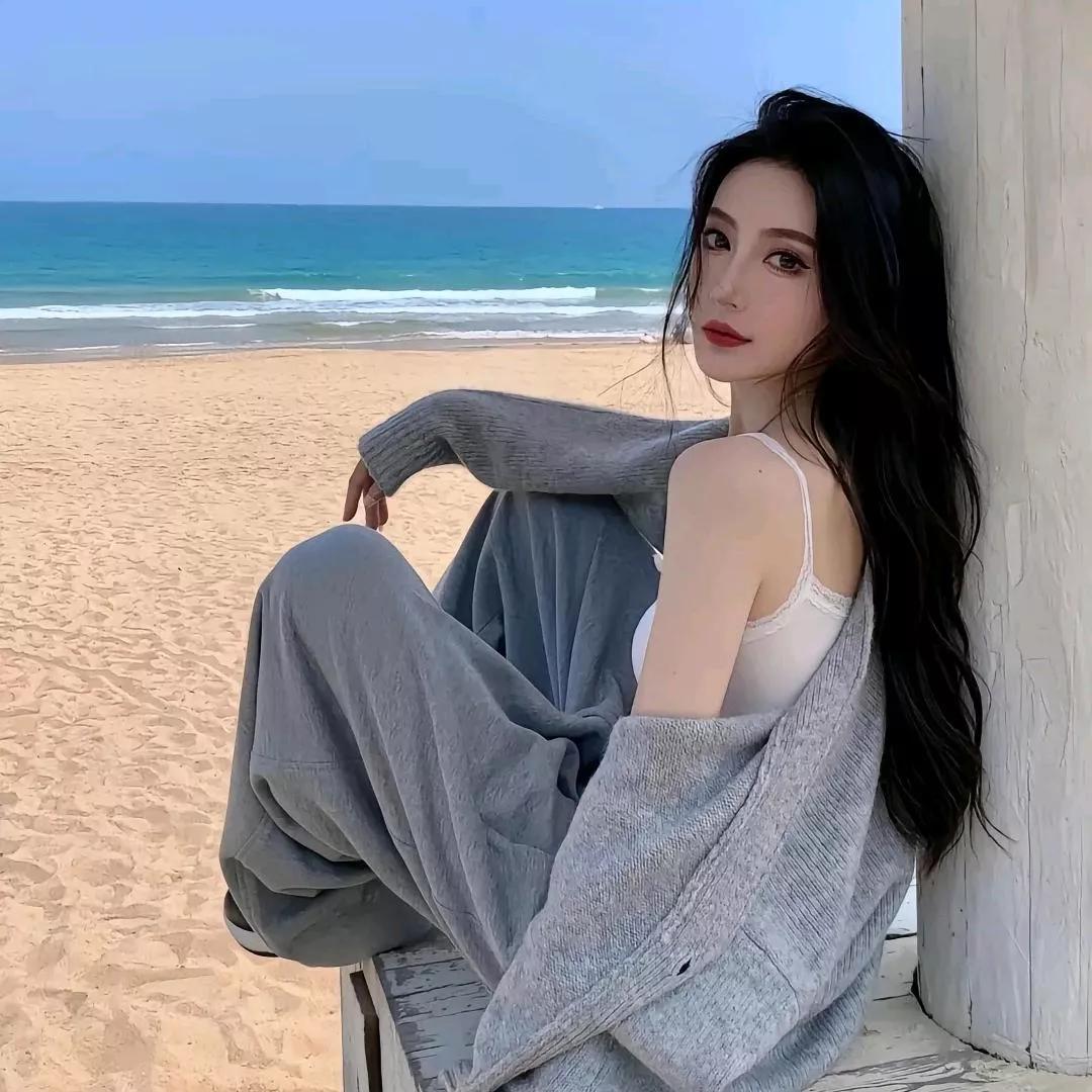 海边慵懒时光，黑发美人倚栏思海滨美人照 美女海边风景 海滨红裙写真 海滨红裙照 
