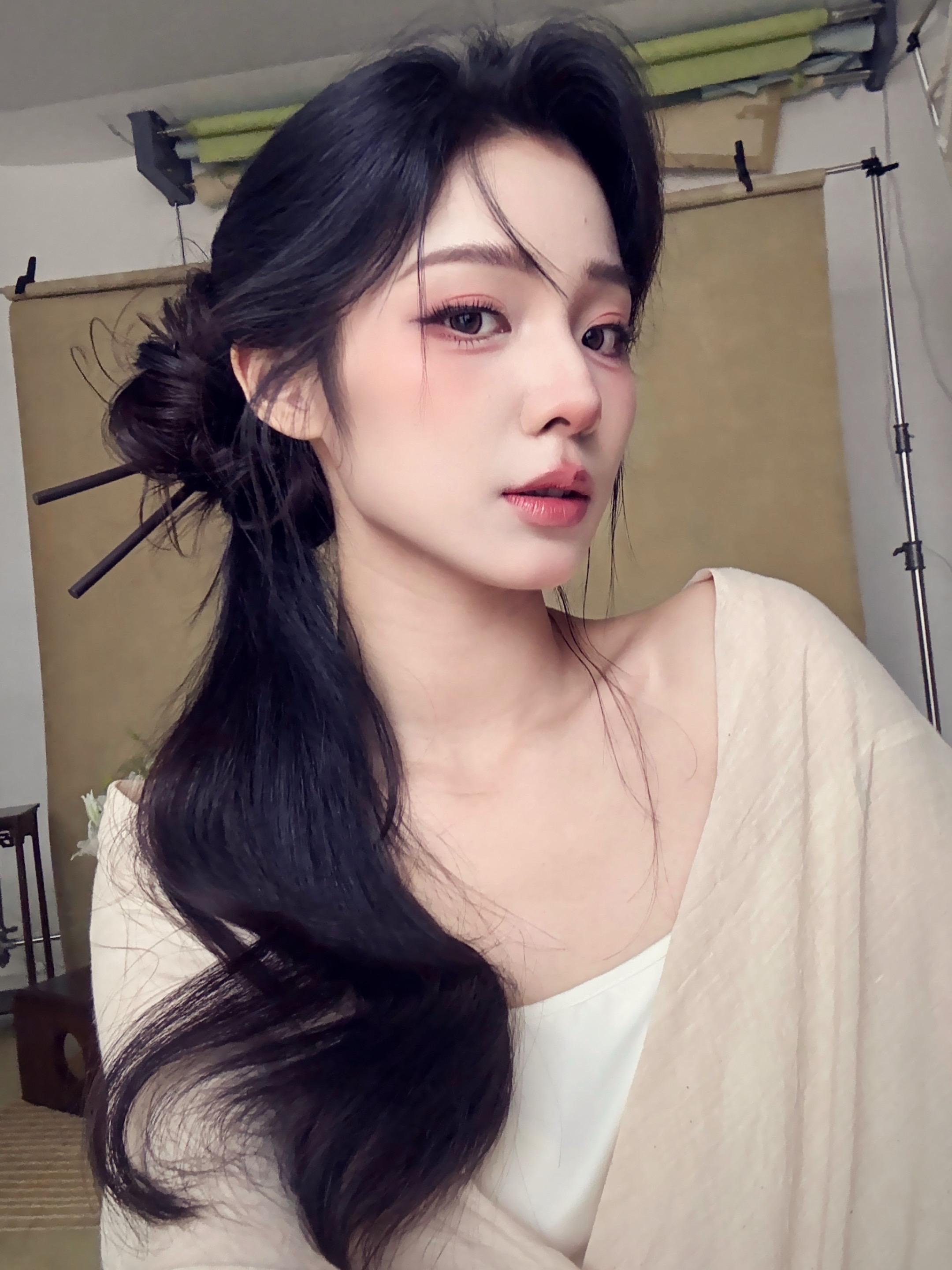 你像一场大雨 淋湿我的眼睛
