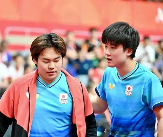 刘国梁在看台上，看着一个19岁的日本小孩兑现了他五天前的狂言