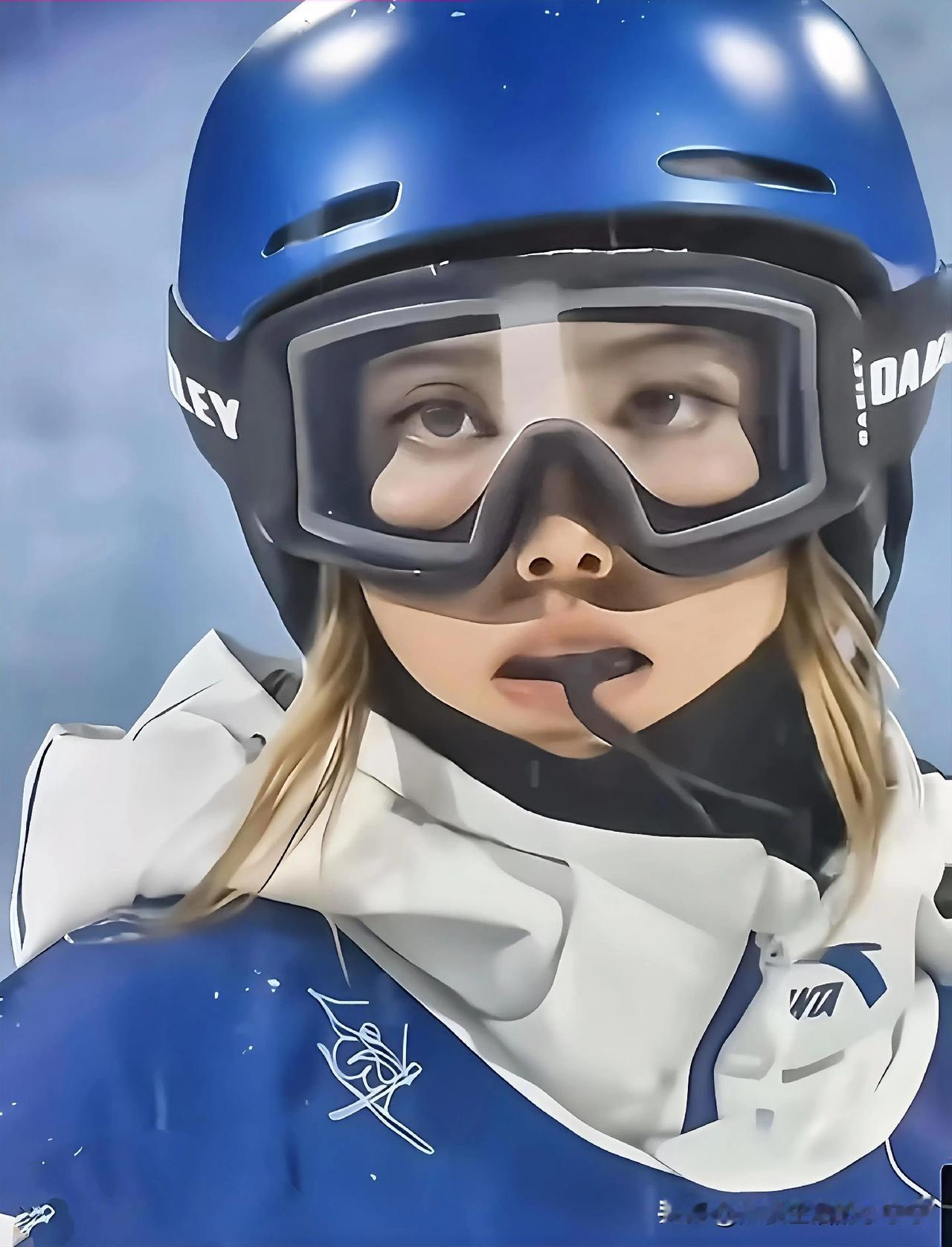 谷爱凌的这张照片，做手机壁纸可好？
    有哪位老师知道，谷爱凌嘴里含的是什么