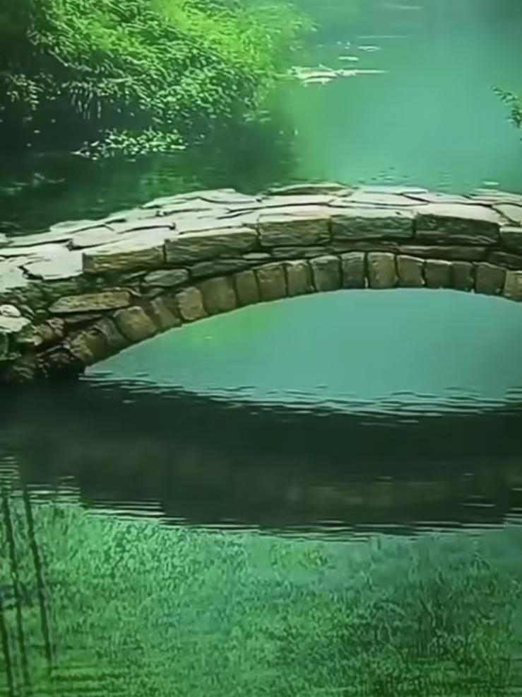 清江引·竹溪秋意
茂竹环溪流碧透，
石桥架清秋。
潺湲逐云悠，
风篁清韵久，
一