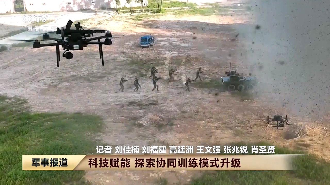 AI科技赋能，陆军探索无人协同作战训练模式升级。地面有试装的无人火力支援车，23