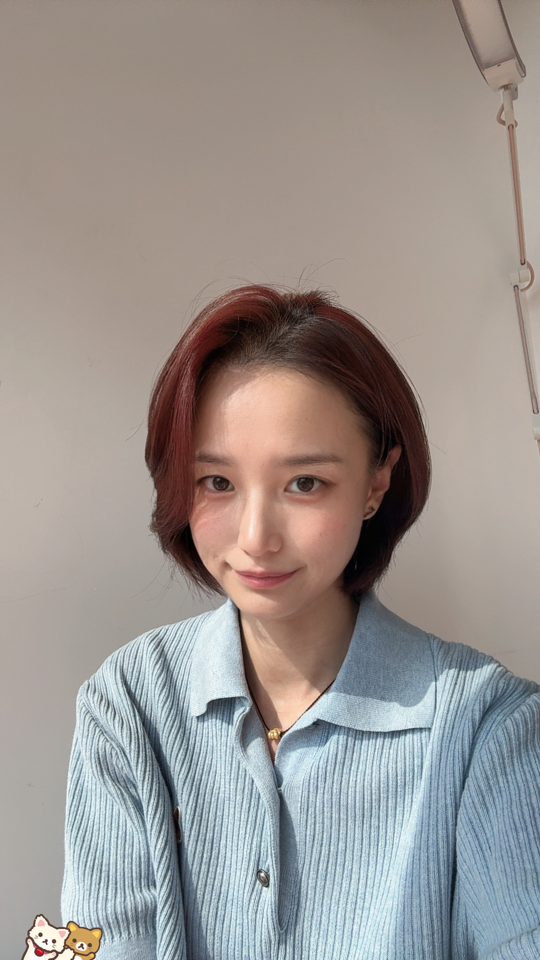 刚剪完回家，感觉不咋样，我努力用美颜相机挽回一下[泪奔] ​​​