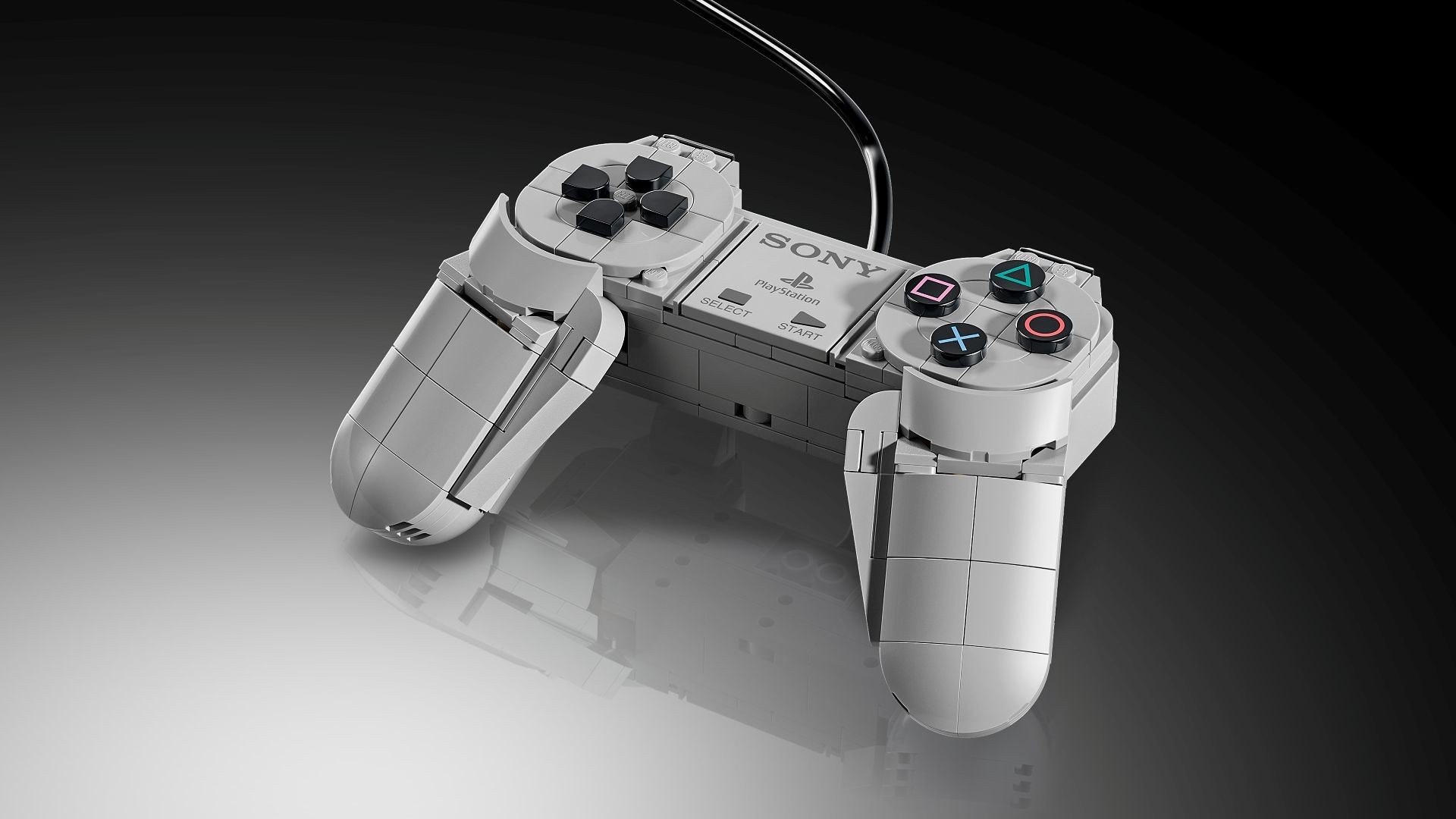 【索尼State of Play首秀乐高初代PlayStation，1:1比例含1911零件】索尼在最新一期State of Play上公布与乐高合作的初代PlayStation主机模型，以近1:1比例还原1994年开启品牌旅程的原机。套装共含1,911个零件，需自行拼装，完成后可作为收藏摆件。

模型内部预留展示空间，附带《捉猴啦》与《GT赛车》 ​