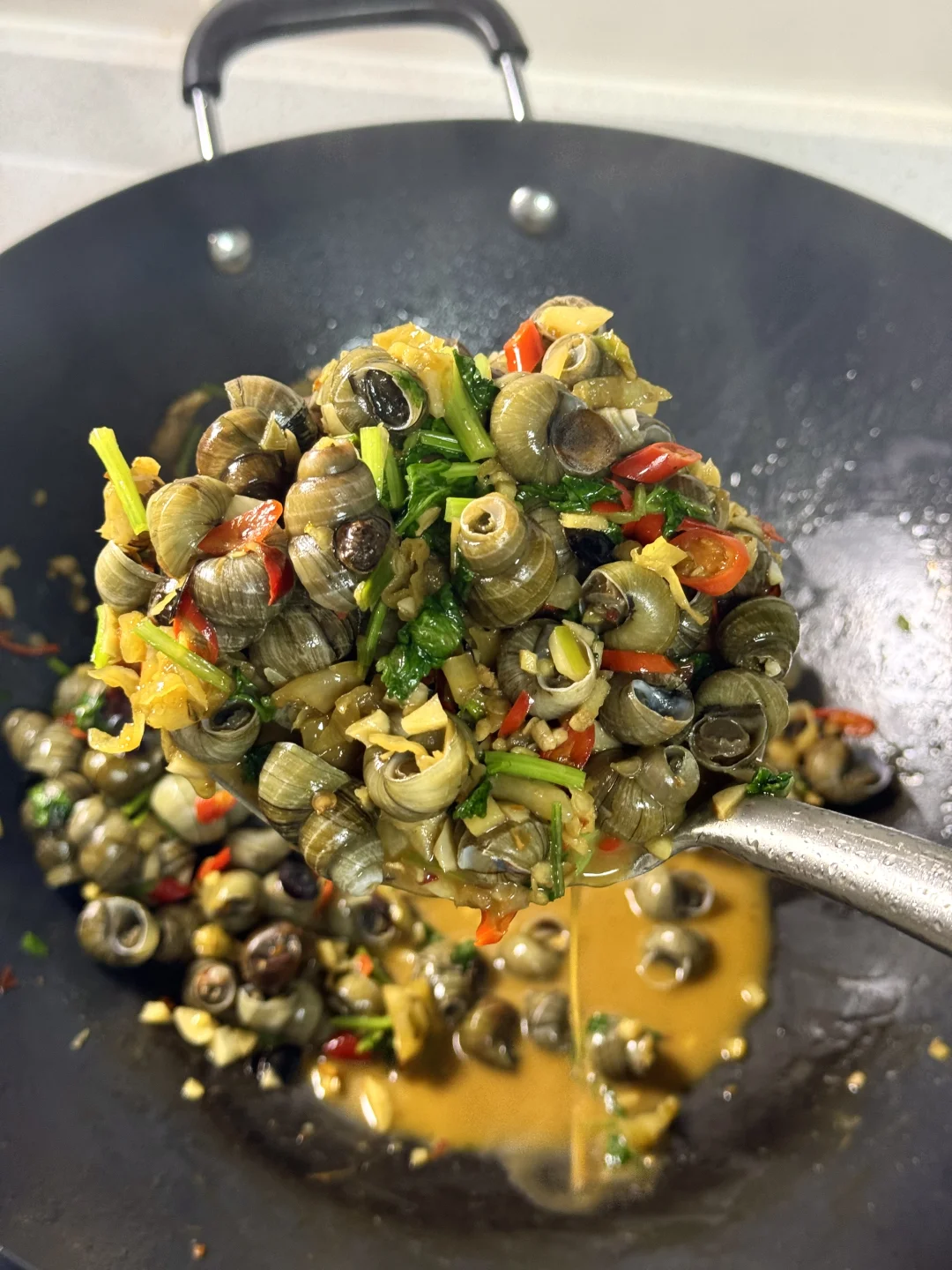 酸辣炒螺狮做法/一盘不够吃