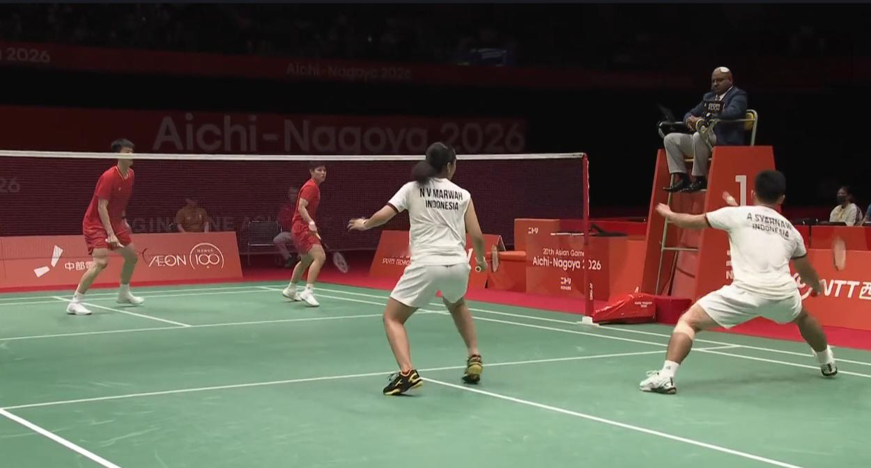 印尼组合西亚那维/马尔瓦直落两局以2：0（21：12、21：14）击败...