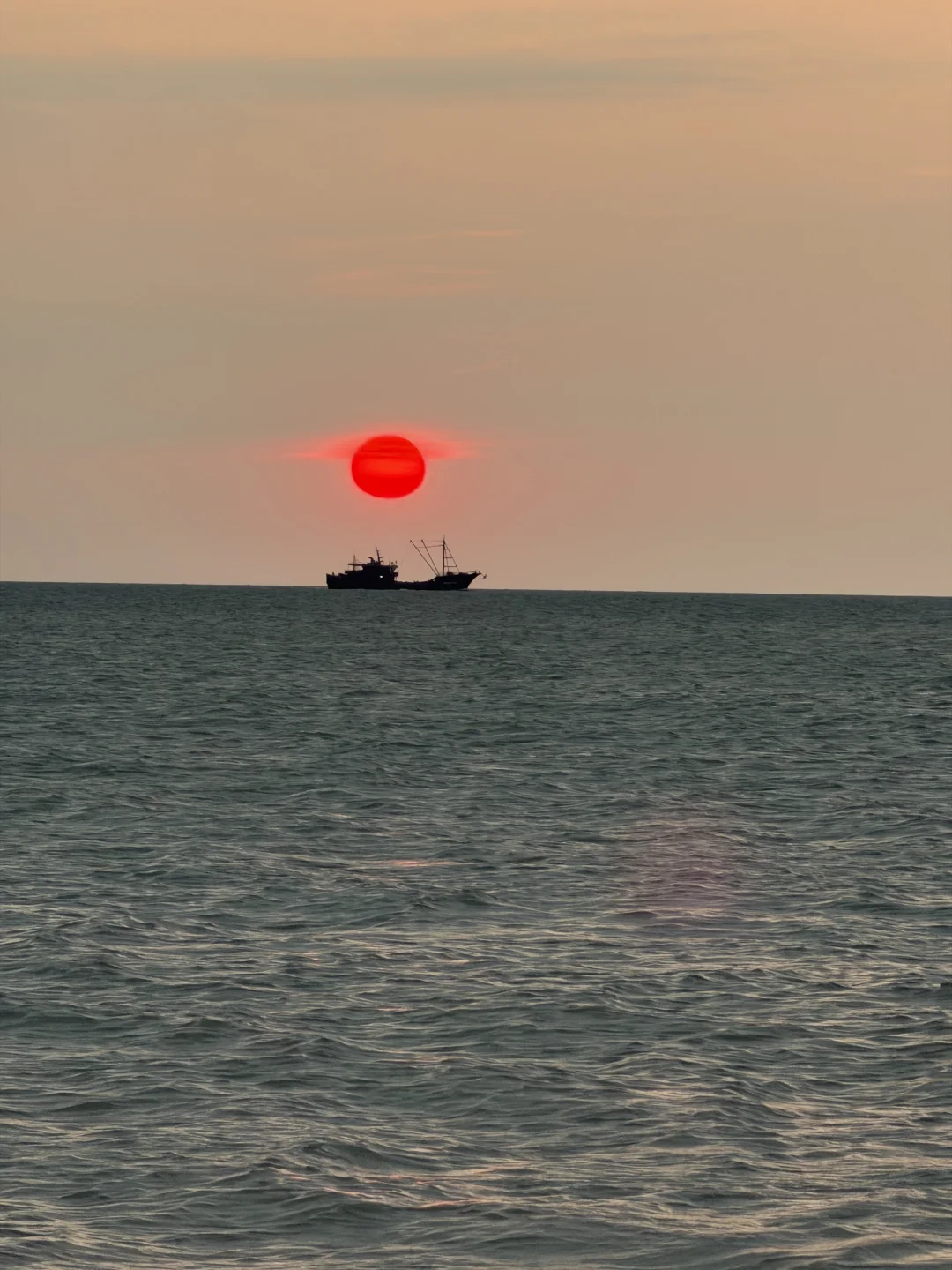 朋友说让我把北海日落发给国家地理杂志