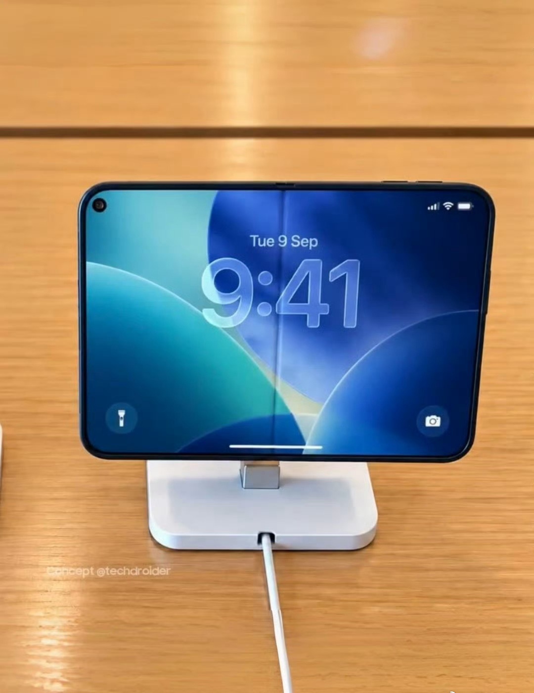 手机iPad二合一恕我直言，图片的iPhone Duo如果是真机实拍，这个折痕也太明显了。[允悲] ​​​