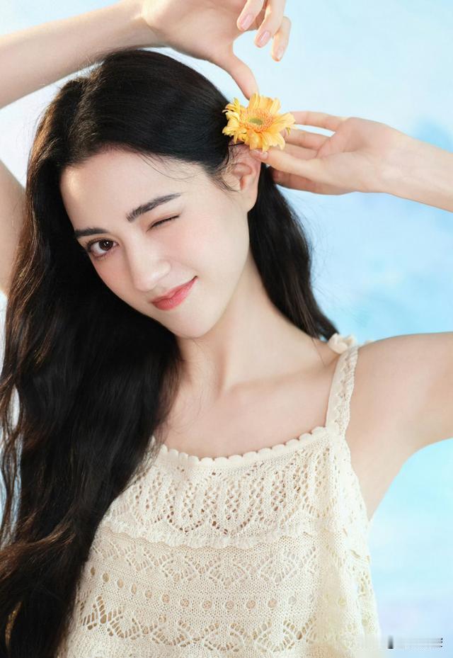 娜然美照。