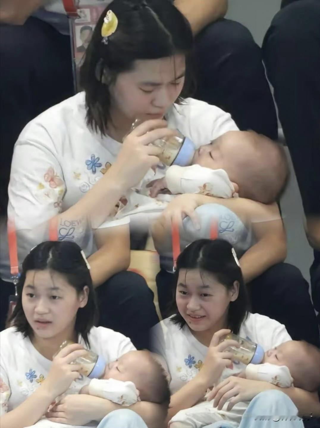世界冠军也逃不过“德华”命：全红婵一边看比赛，一边给娃喂奶，笑不活了

别人看跳水，看的是水花消没消失；全红婵看跳水，看一眼赛场，手已经伸过去接娃了。

女子双人3米板决赛，陈艺文/林珊在池子里冲金，全红婵在观众席上干起了另一门“副业”——德华。怀里一个奶娃娃，手里一只奶瓶，头刚抬起给队友喊两声“漂