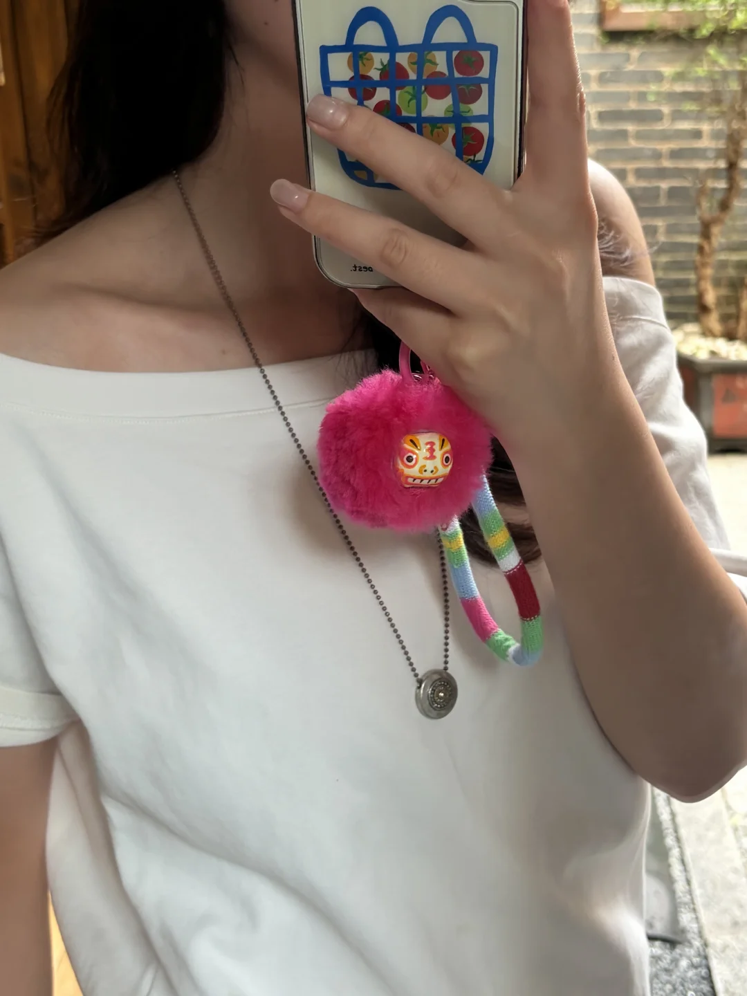 把大皮老虎缩小后，我们做成了手机挂绳